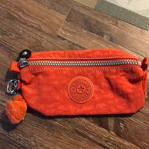 NWOT Kipling cosmetic bag, never used, orange